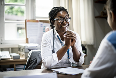 A doctor talking to a patient