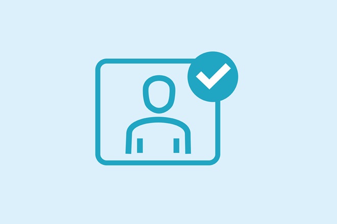 An icon of an identity card and check-mark