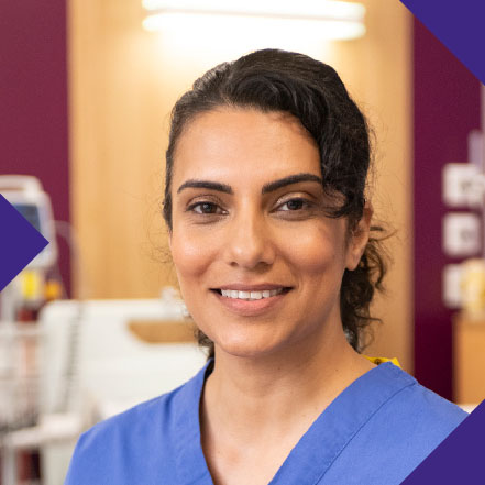 female doctor in a hospital setting head shot