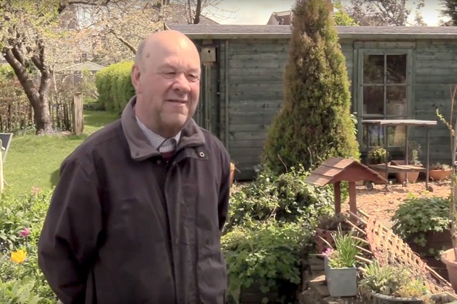 A carer stood outside talking about their experiences