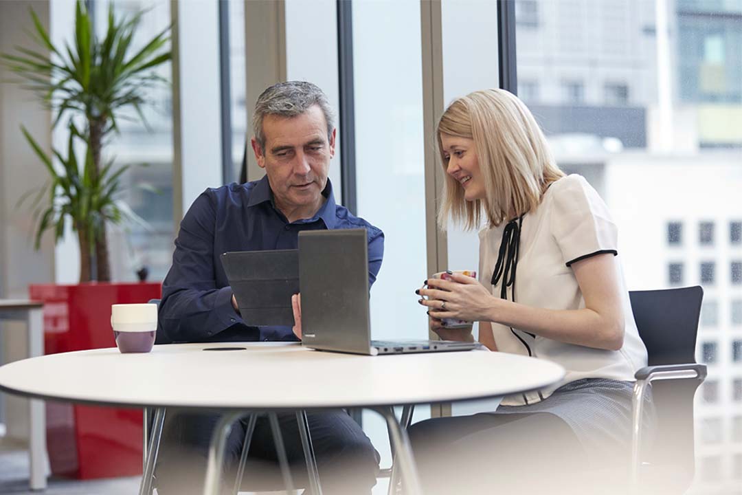 A Responsible officer and doctor sitting talking at a desk