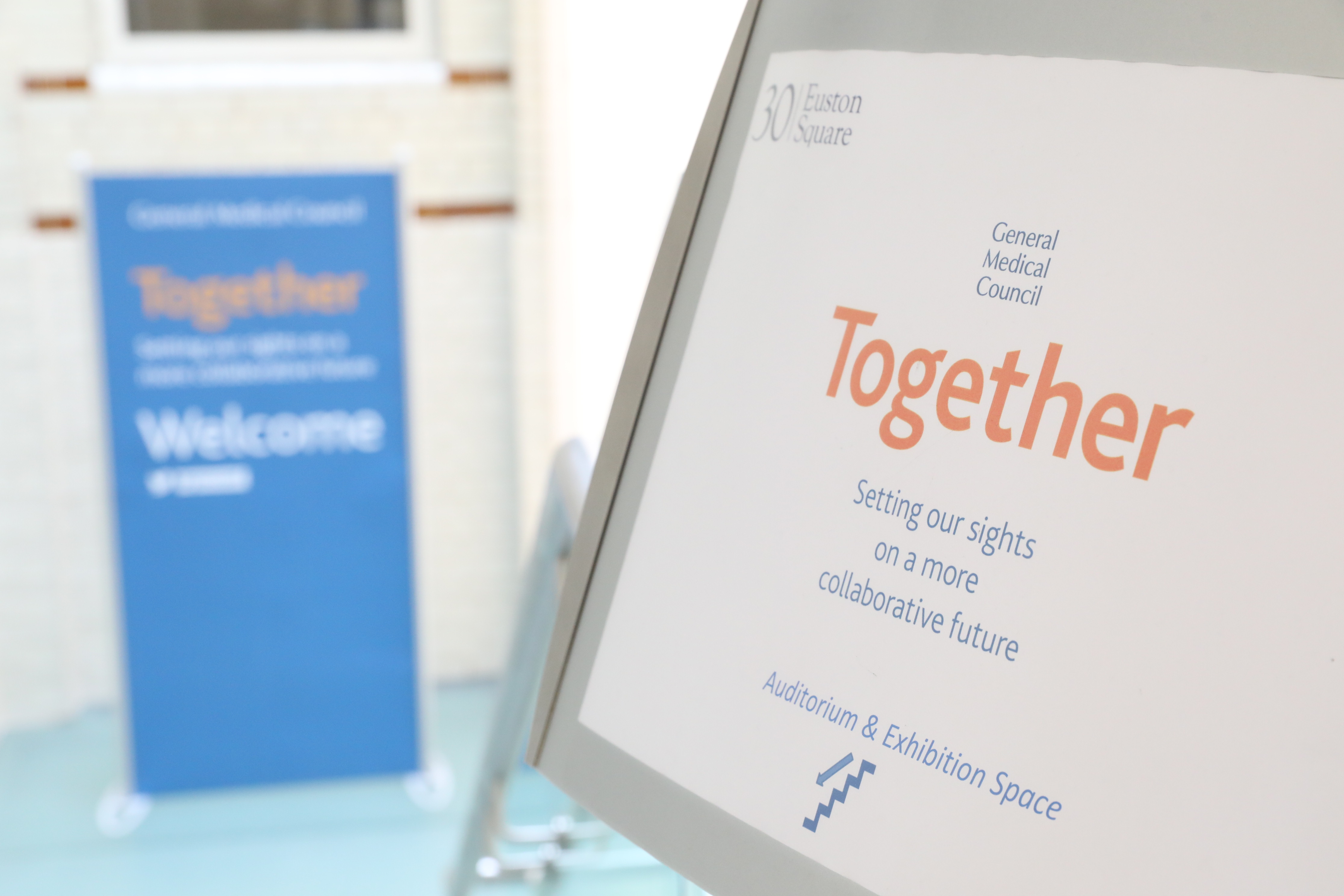 Working together sign