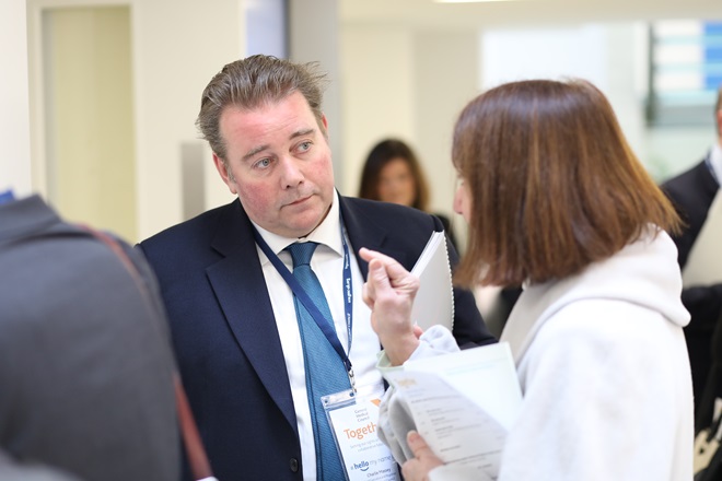 GMC Chief executive in conversation, at an event