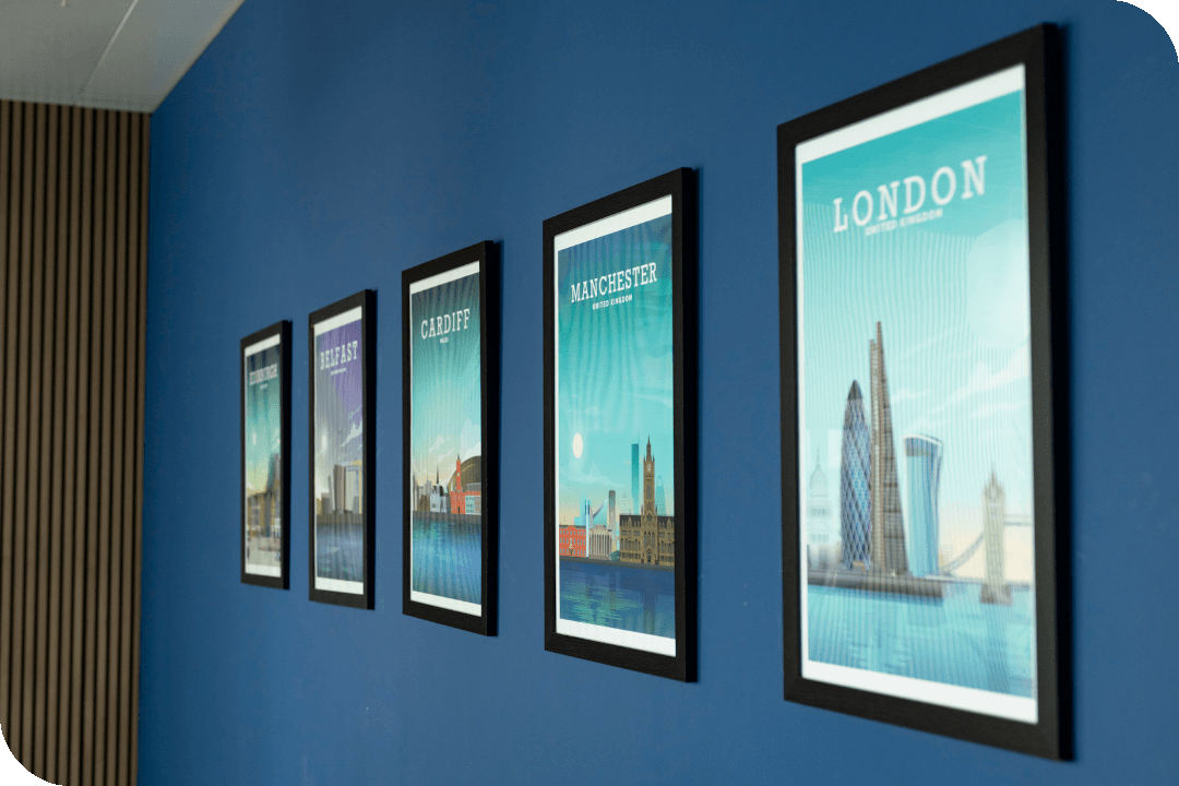 Posters on a wall of various locations