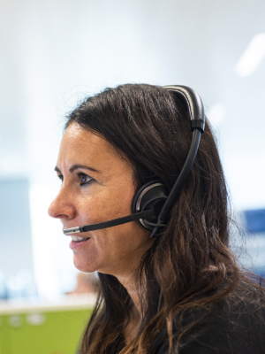An IS team member taking a support call