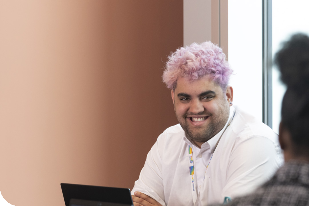 A member of staff in a meeting