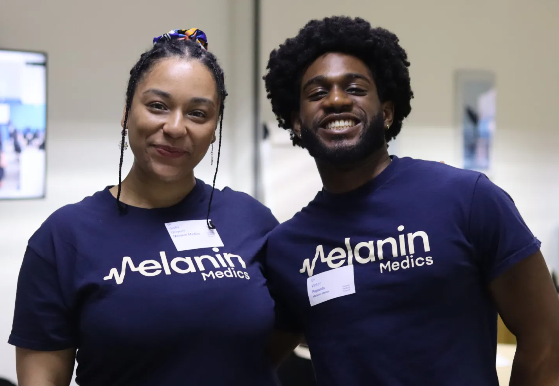 Two members of melanin medics