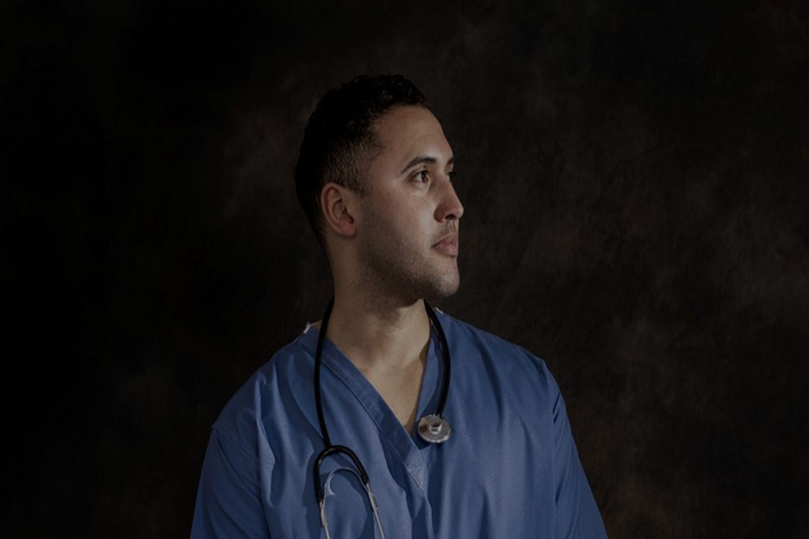 doctor in blue scrubs