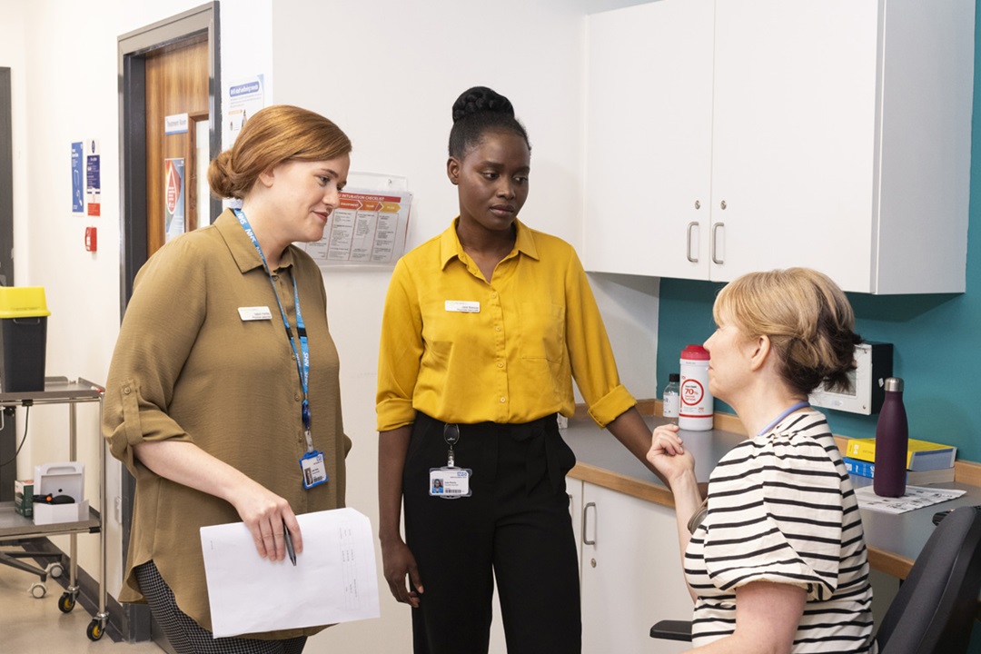 Physician associates in conversation with a doctor